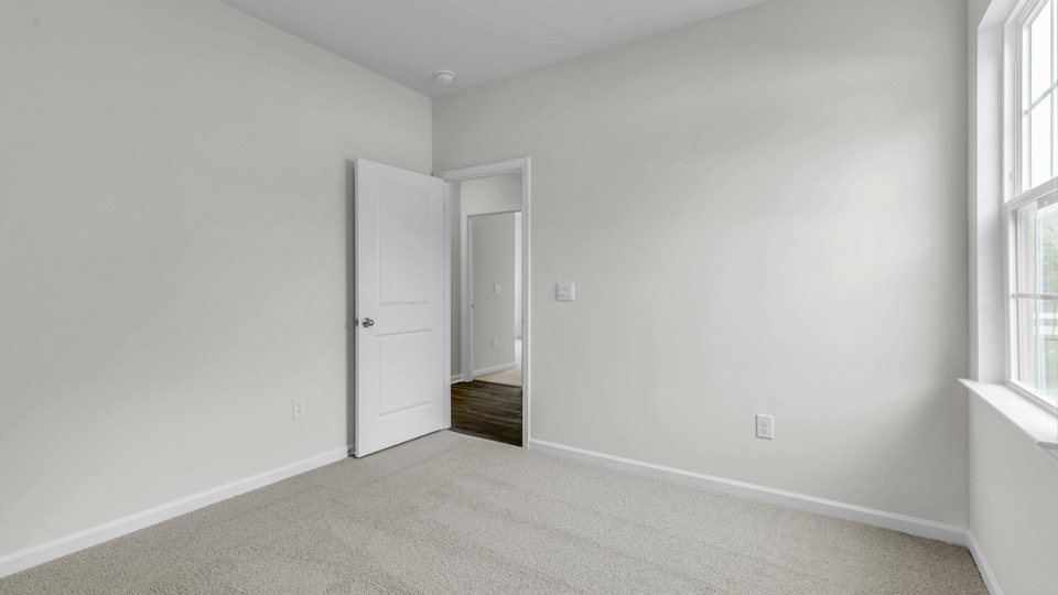 Bedroom with carpet