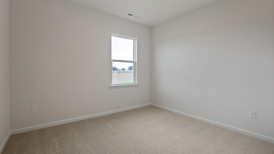 Bedroom with carpet