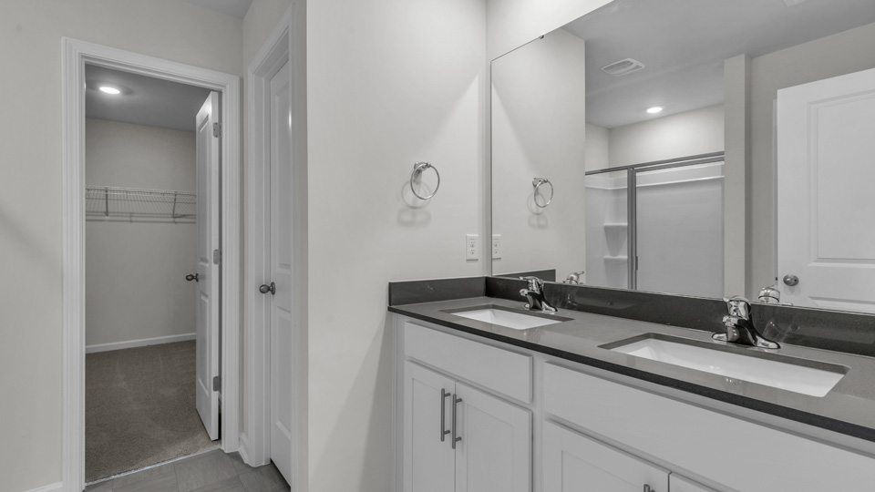 Bathroom with white cabinets