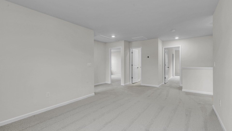 Loft area with carpet