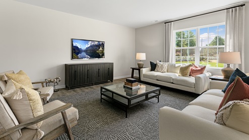 living area with open space, revwood flooring and ample light