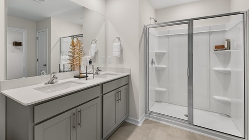 bathroom with revwood flooring and walk-in shower