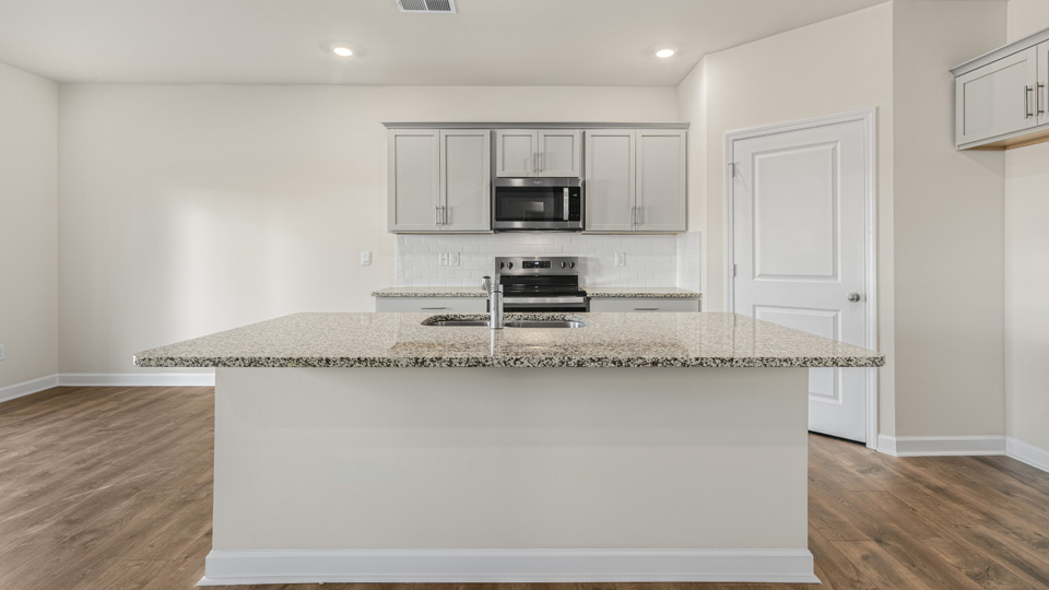 Kitchen with grey cabinets