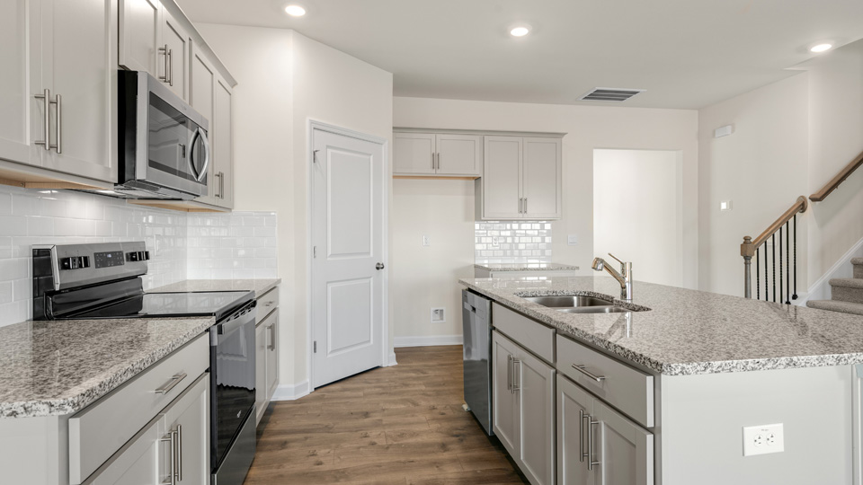 Kitchen with grey cabinets