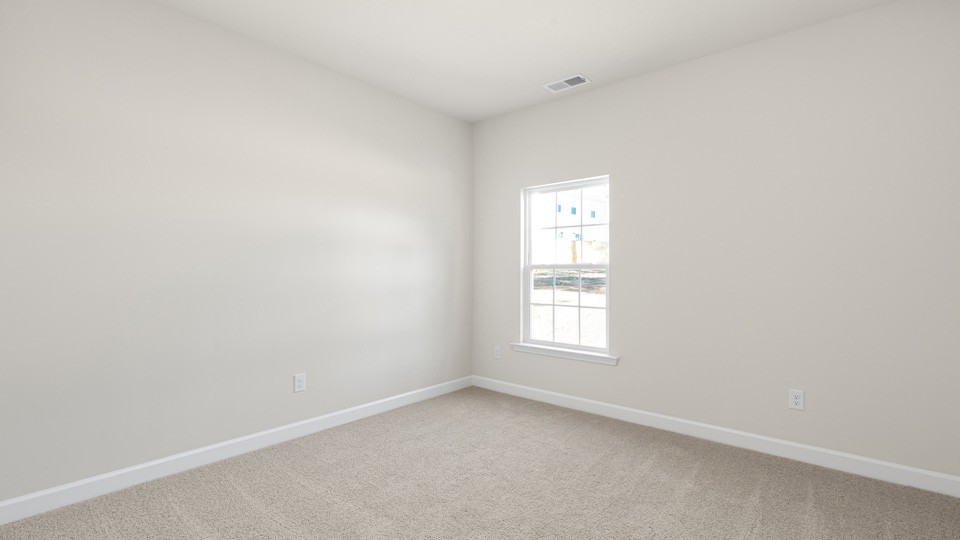 Bedroom with carpet flooring