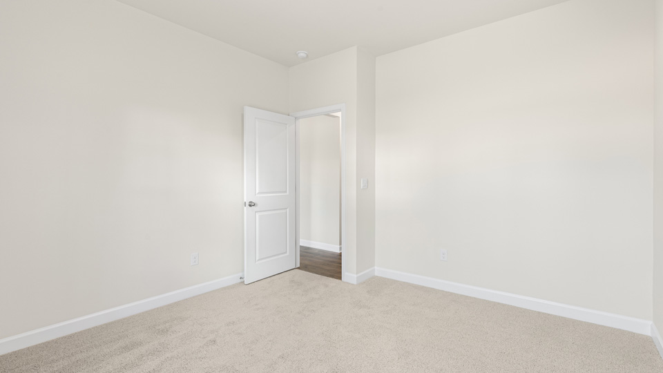 Bedroom with carpet flooring
