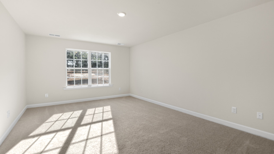 Bedroom with carpet flooring
