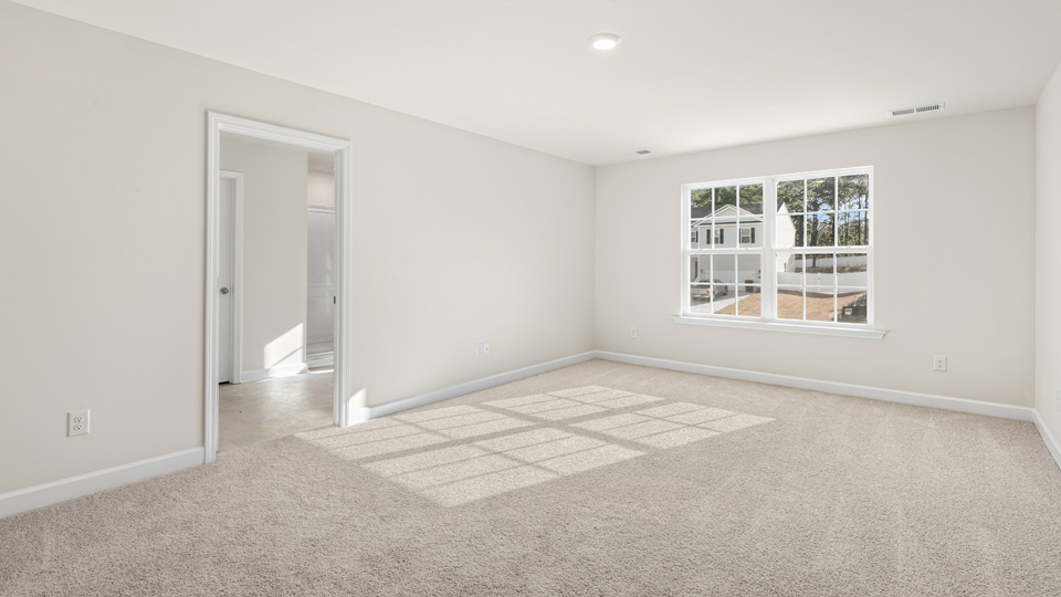 Bedroom with carpet flooring