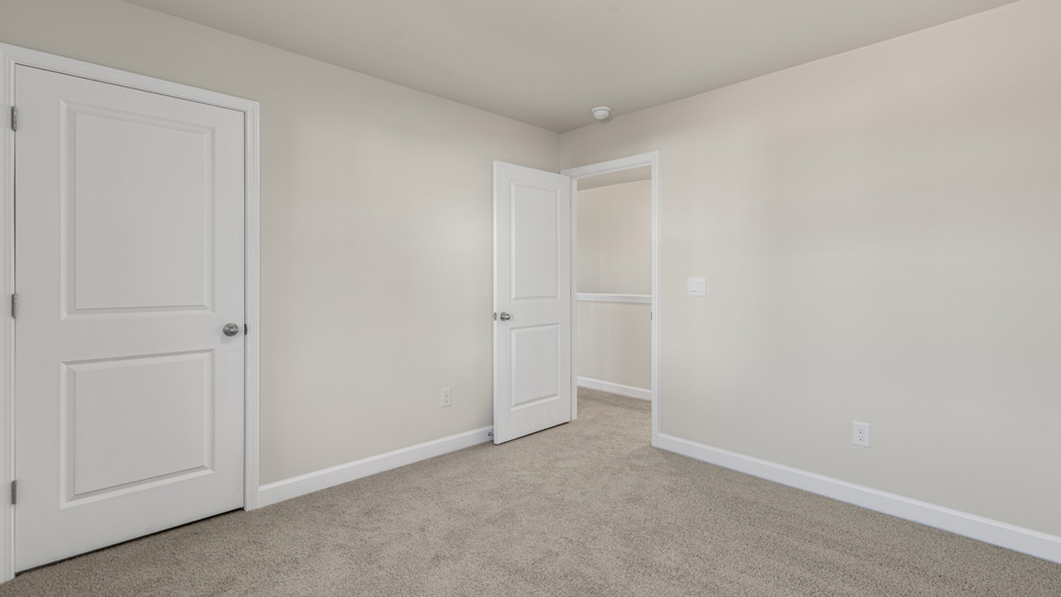 Bedroom with carpet flooring