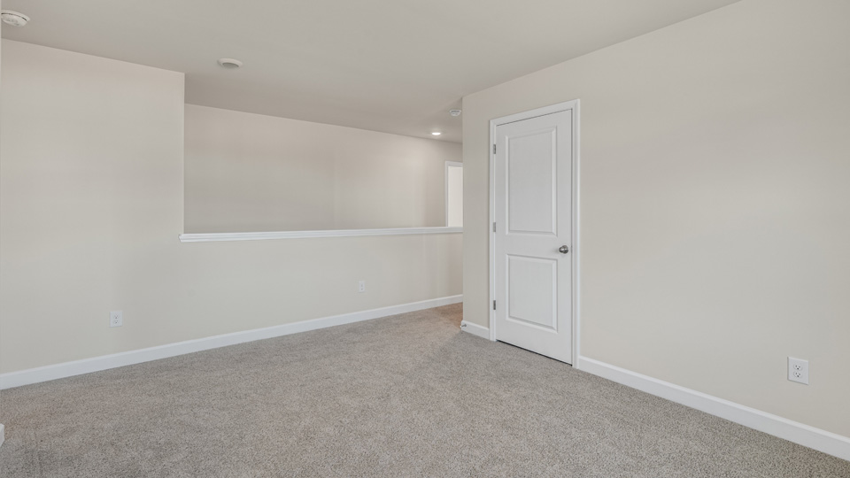 Loft area with carpet