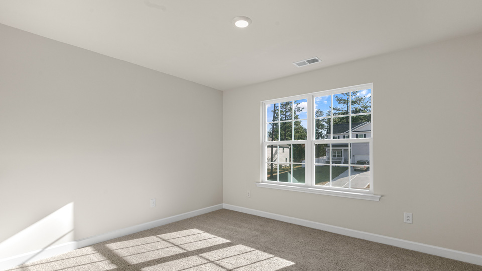 Bedroom with carpet flooring