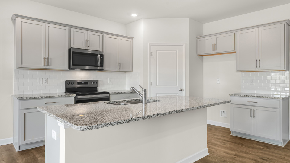Kitchen with grey cabinets