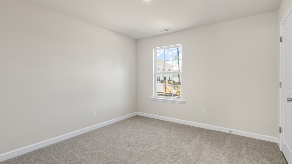 Bedroom with carpet flooring