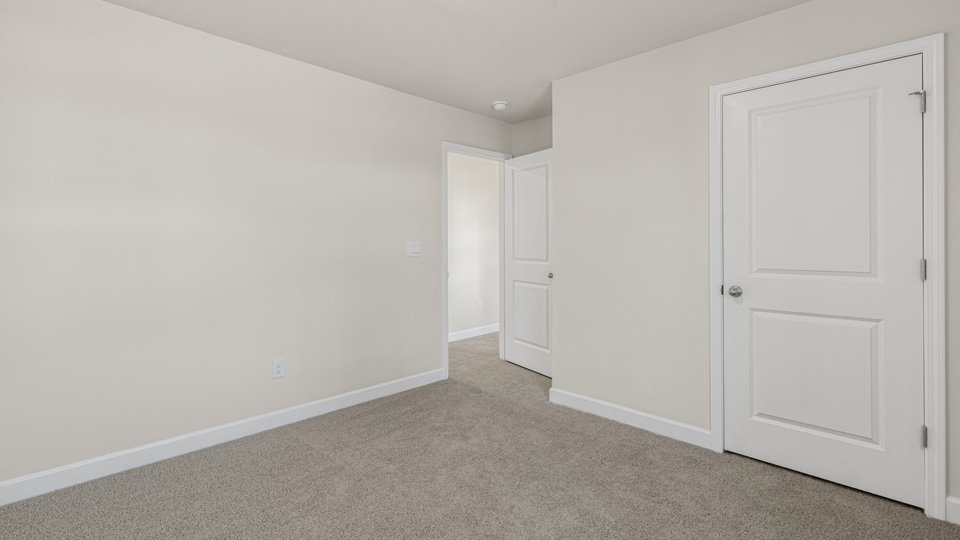 Bedroom with carpet flooring