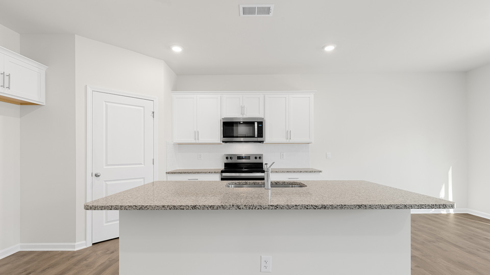 Kitchen with white cabinets