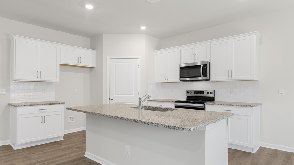 Kitchen with white cabinets