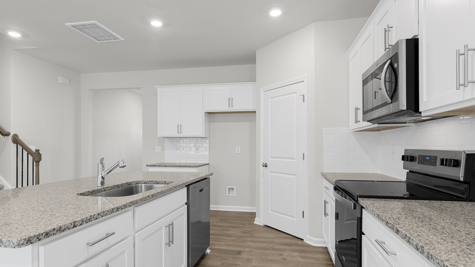 Kitchen with white cabinets