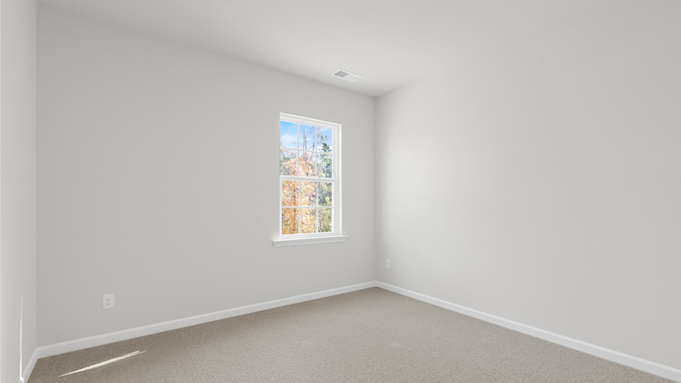 Bedroom with carpet flooring