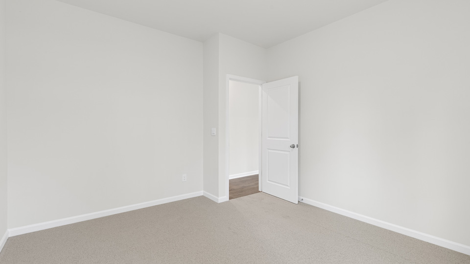 Bedroom with carpet flooring
