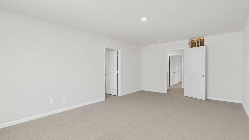 Bedroom with carpet flooring