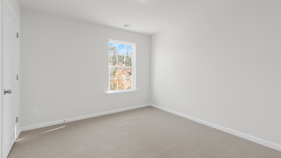 Bedroom with carpet flooring