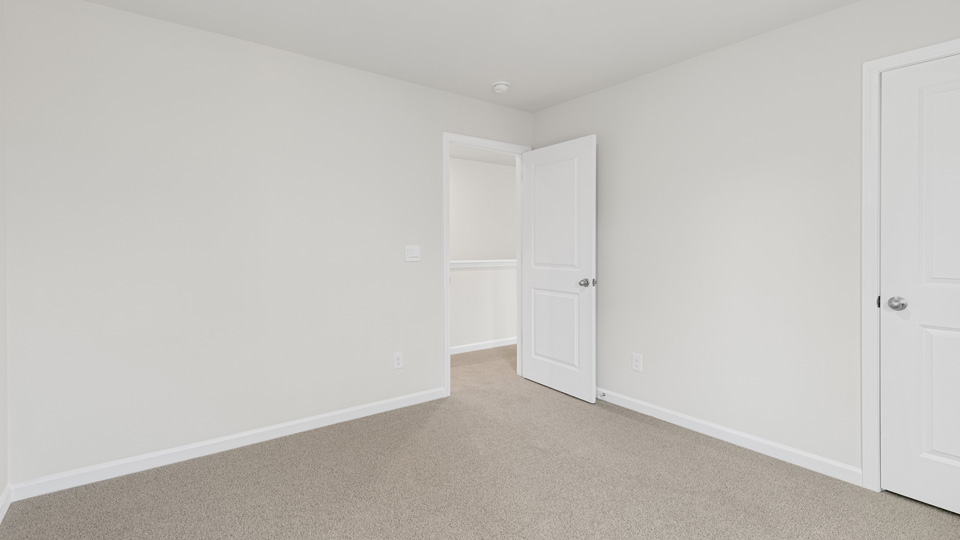 Bedroom with carpet flooring