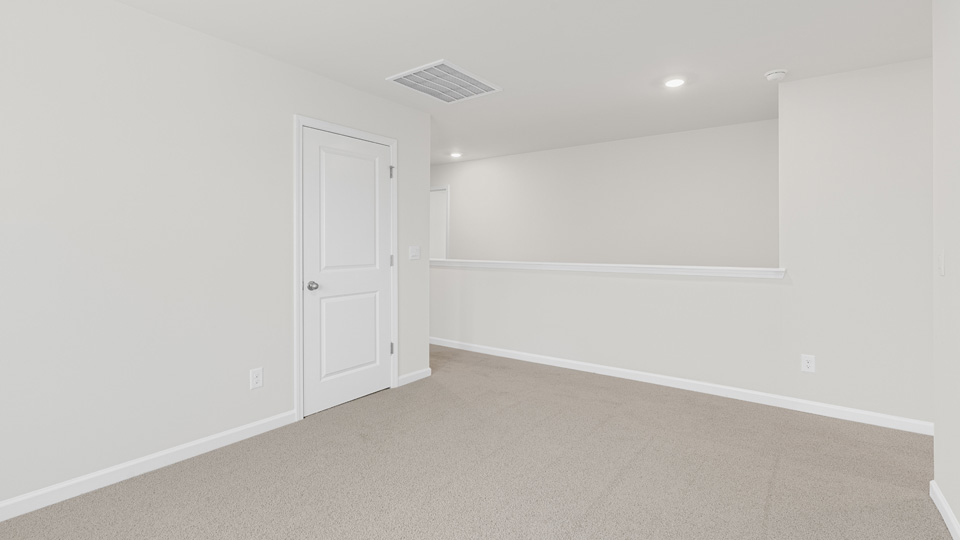 Loft area with carpet