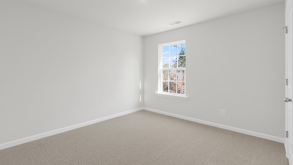 Bedroom with carpet flooring