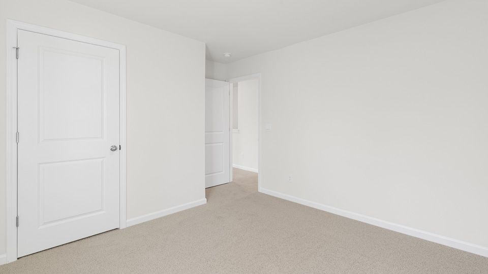 Bedroom with carpet flooring