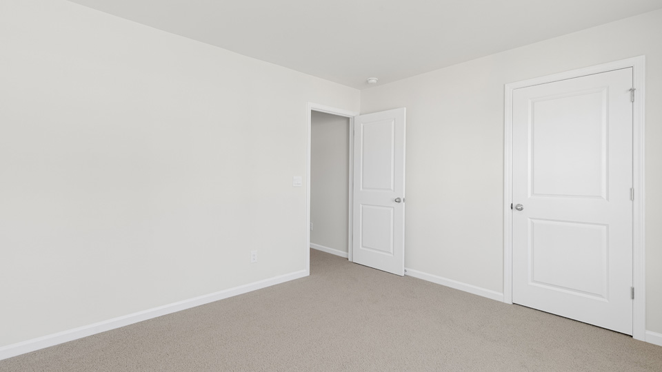 Bedroom with carpet flooring