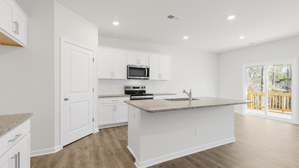 Kitchen with white cabinets
