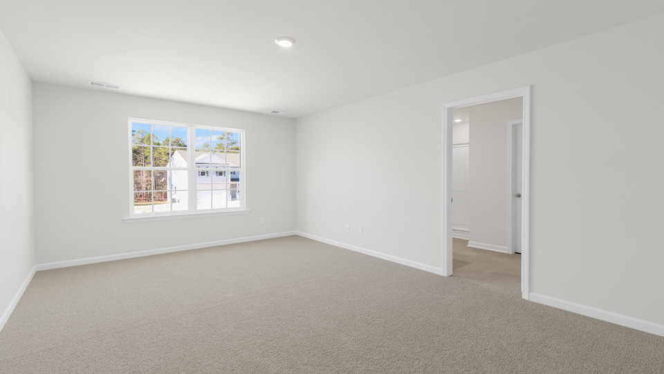 Bedroom with carpet flooring