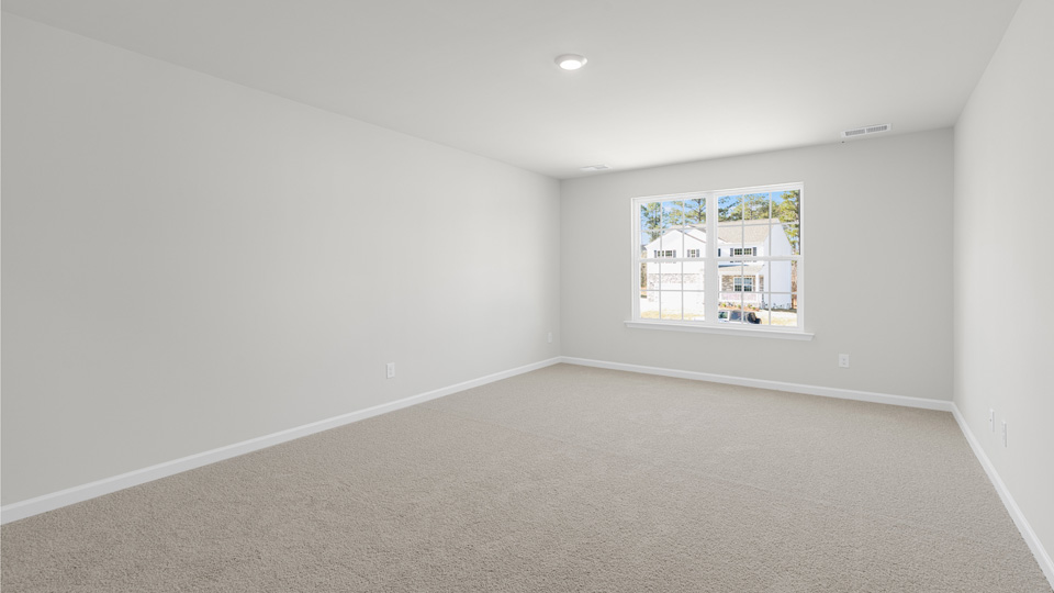 Bedroom with carpet flooring
