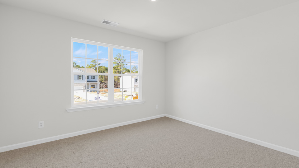 Bedroom with carpet flooring