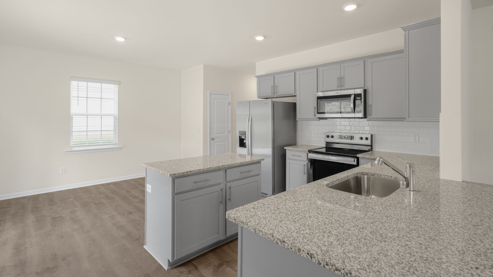 Kitchen with grey cabinets