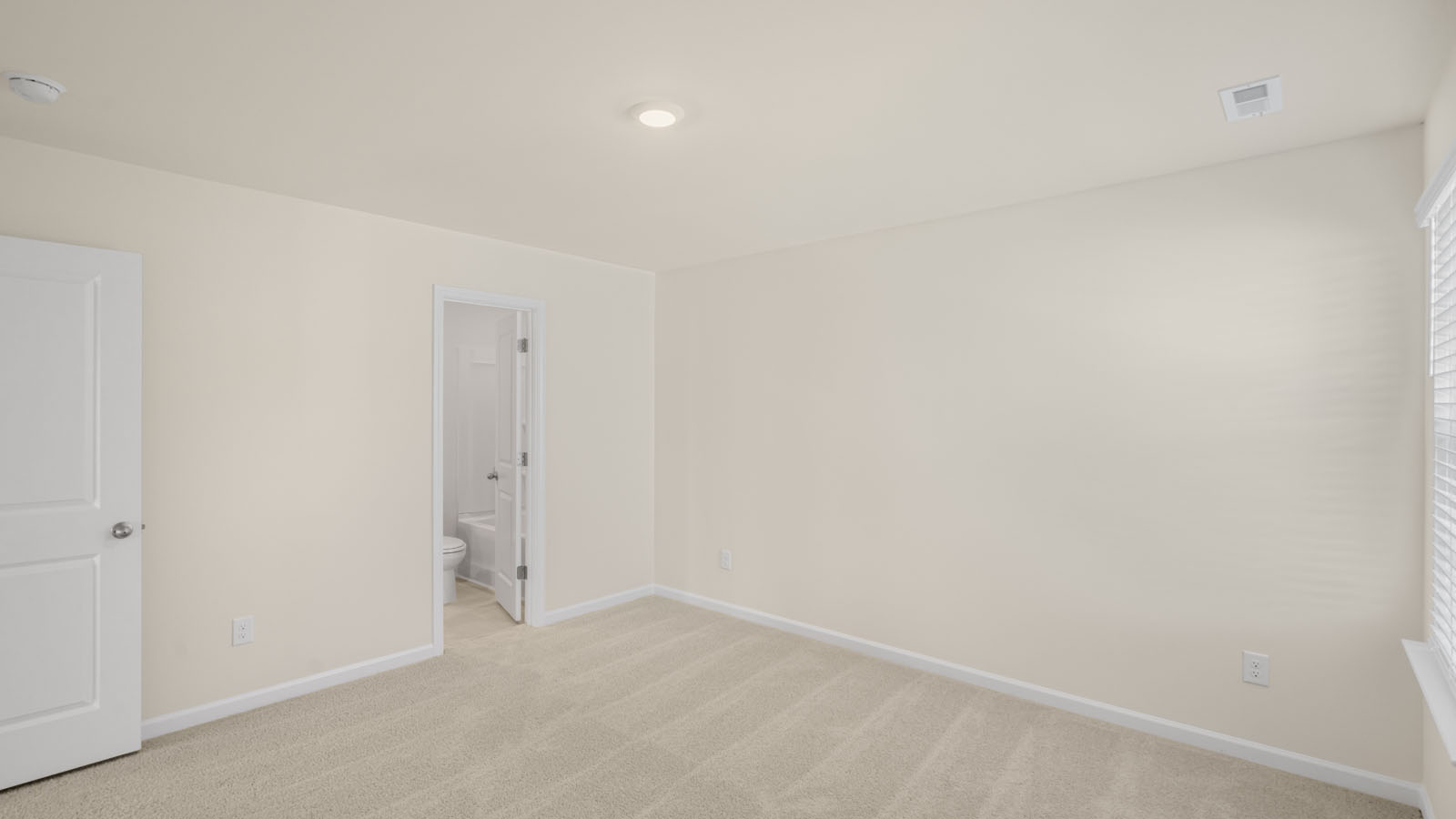 Bedroom with carpet flooring