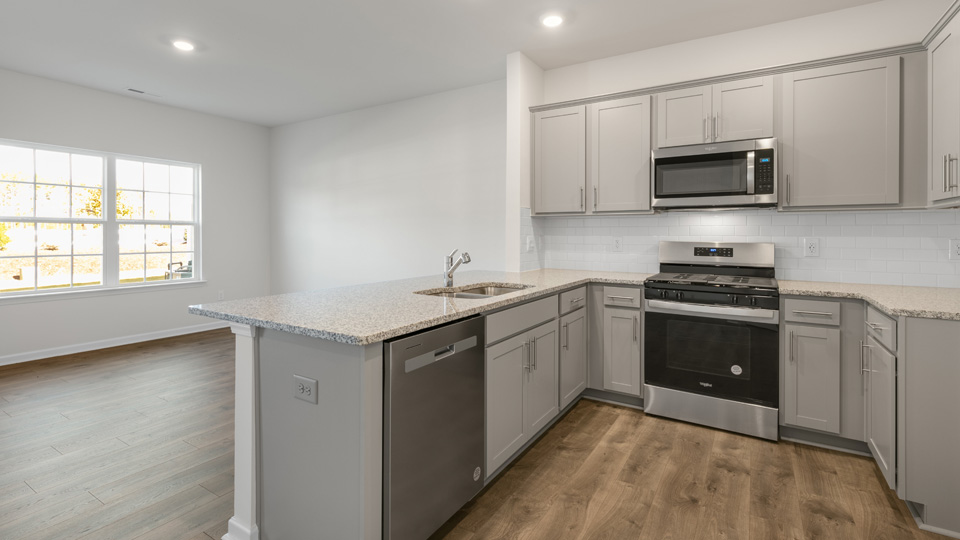 Kitchen with grey cabinets
