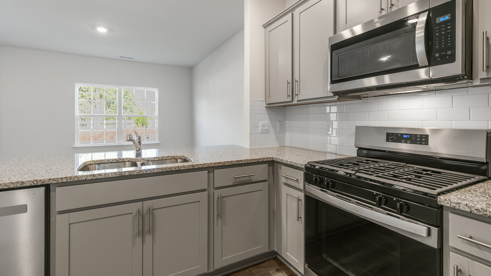 Kitchen with grey cabinets