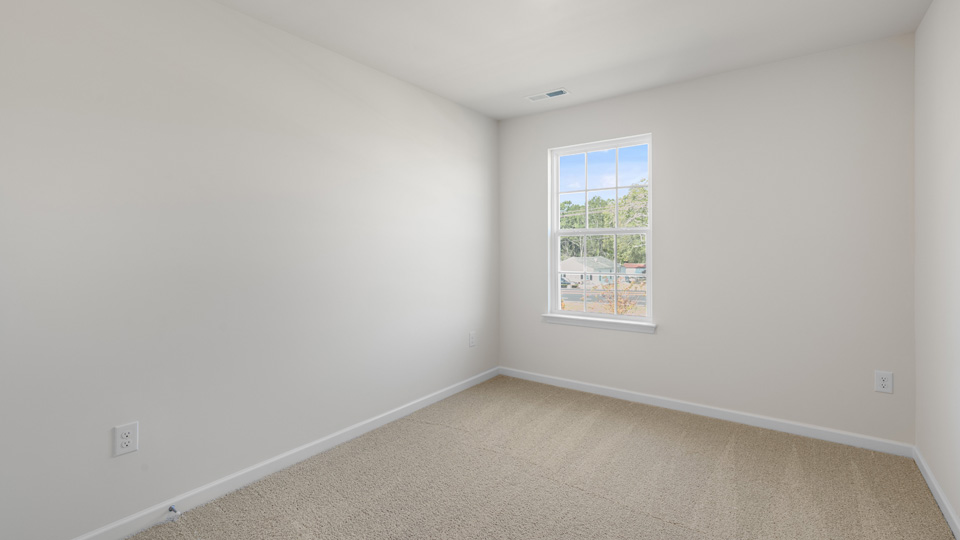 Bedroom with carpet