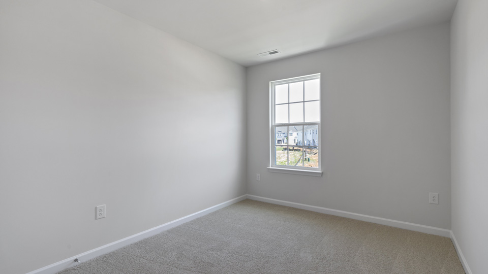 Bedroom with carpet