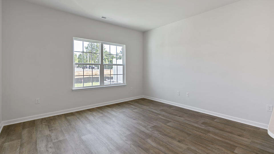 open concept living space with large windows
