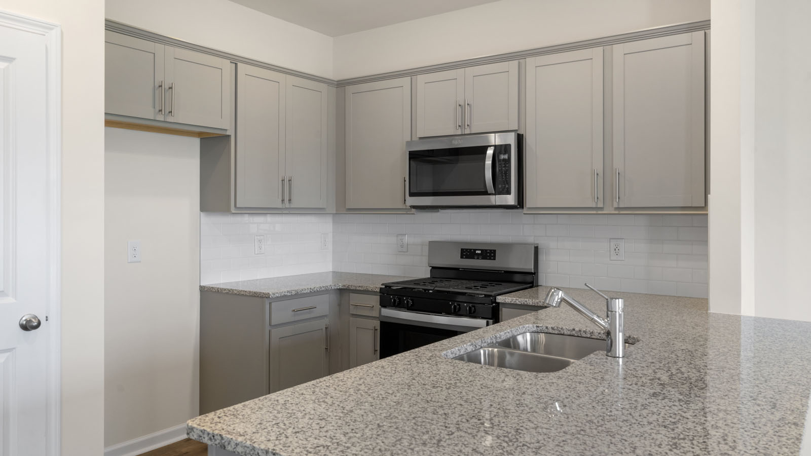 Kitchen with grey cabinets