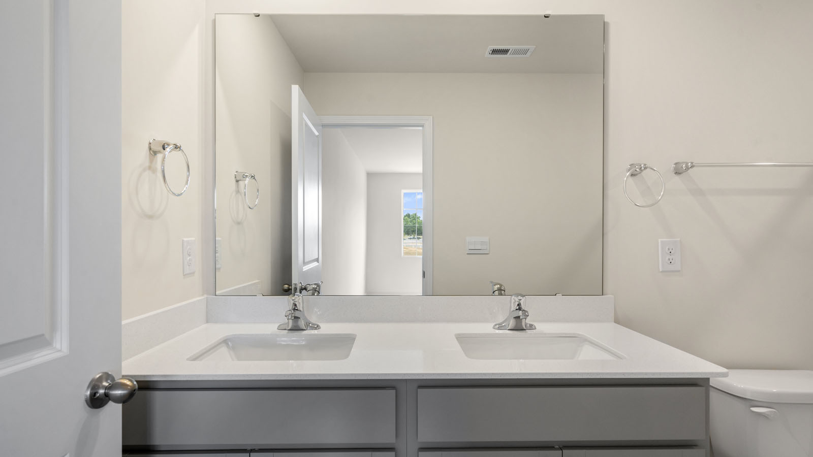 Bathroom with grey cabinets