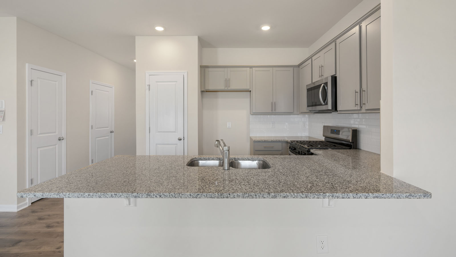 Kitchen with grey cabinets
