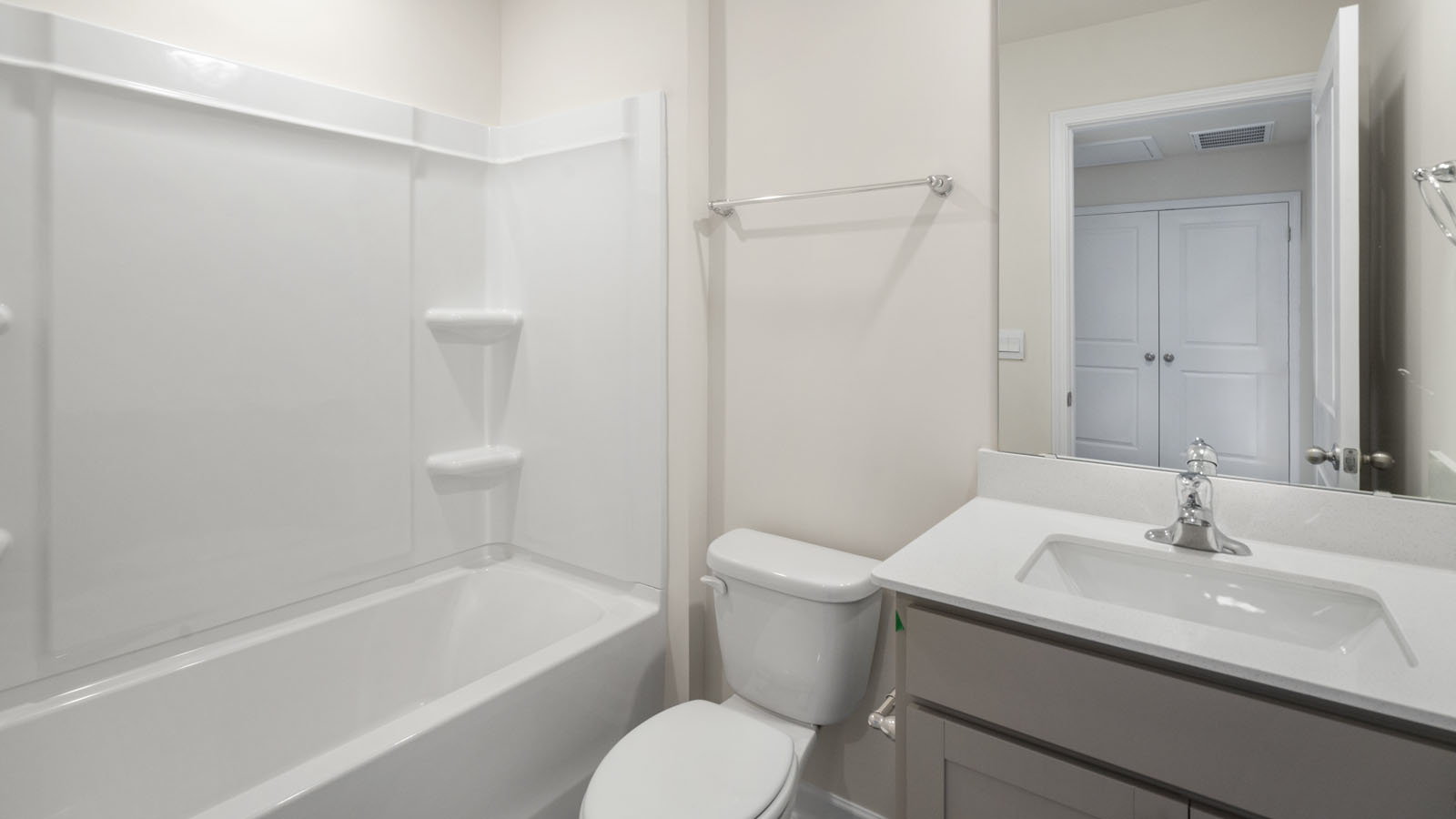 Bathroom with grey cabinets