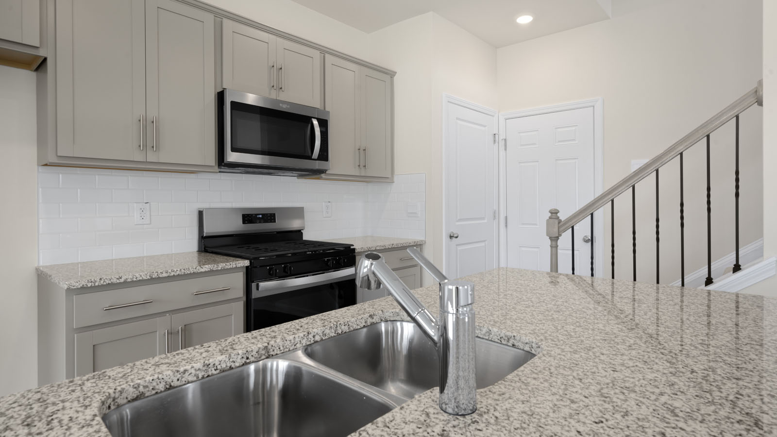 Kitchen with grey cabinets