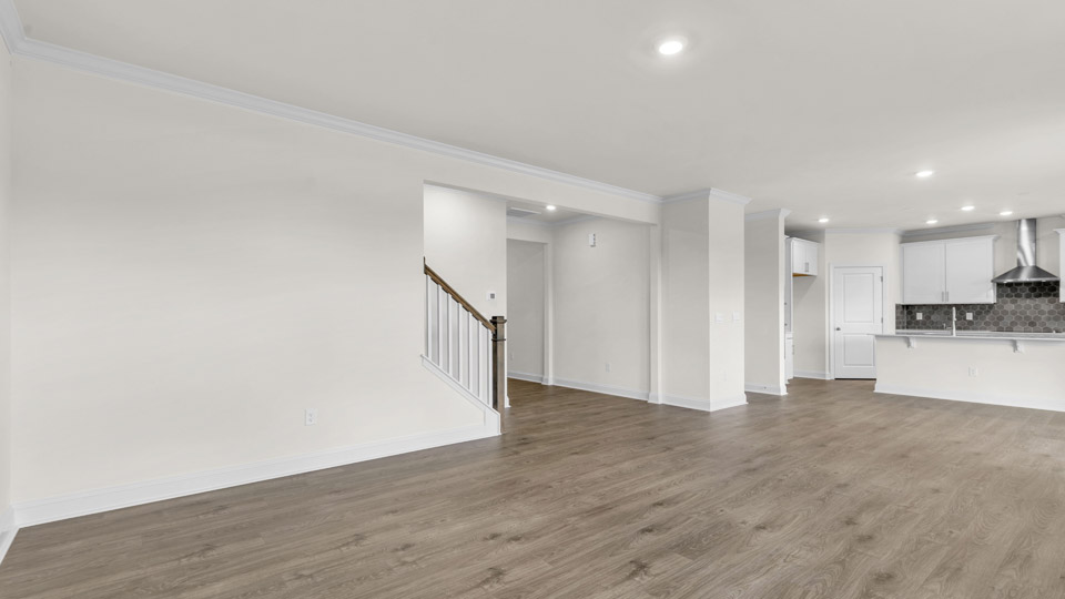 living room with revwood flooring
