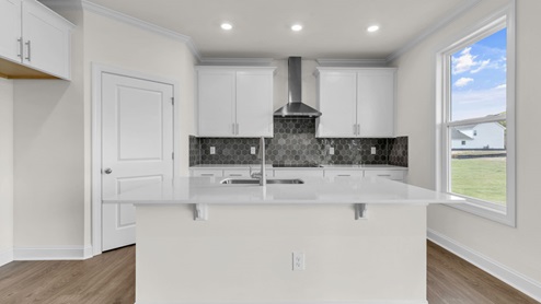 kitchen with white cabinets and quartz countertops