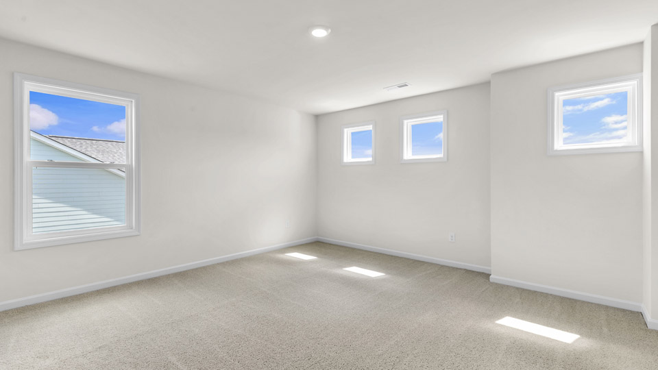 loft with carpet flooring