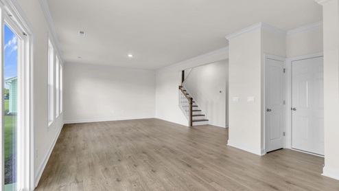 living room with revwood flooring